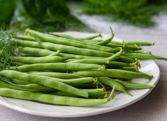 Frische Fisolen unreife bohnen aufgelegt