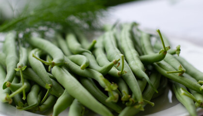 Frische Fisolen unreife bohnen aufgelegt