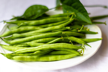Frische Fisolen unreife bohnen aufgelegt