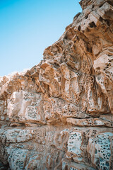 Cheese rocks from quartzite sandstone on Balck Sea in Crimea.