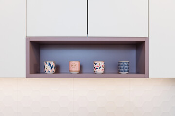 Detail of kitchen cabinet in modern apartment