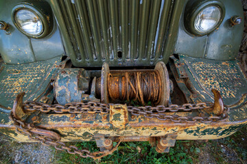 Abandoned old rusty truck in park