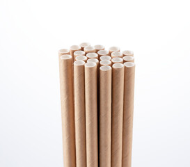 Paper straws in a glass.