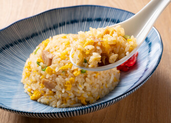 Fried rice in a blue plate.