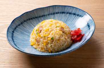 Fried rice in a blue plate.