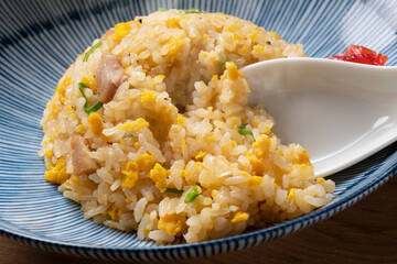Fried rice in a blue plate.