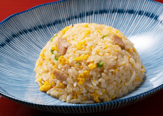 Fried rice in a blue plate.