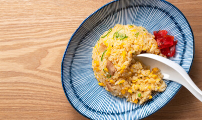 Fried rice in a blue plate.