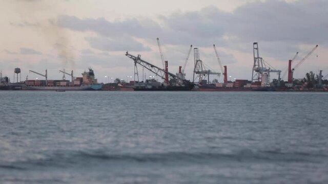 Industrial shipyard at sunset in Central America
