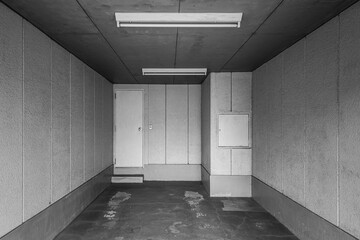 Perspective of Empty dark basement concrete room.
