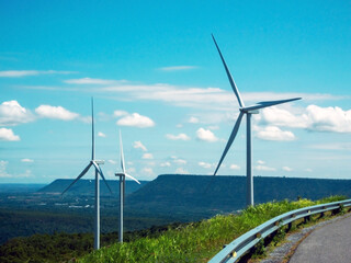 The landscape of electricity generating turbines on the mountains.