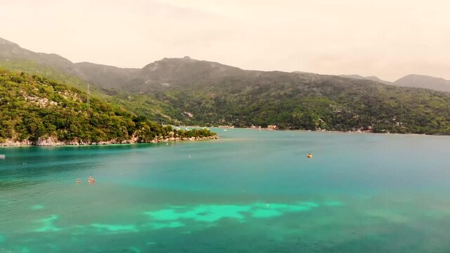 drone shot on island beach of labadee, haiti royal carribean private island