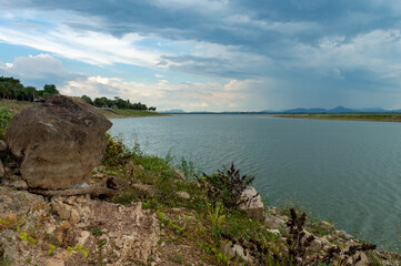 Fototapeta na wymiar Landscape of Pasak Jolasid Dam with little water capacity.