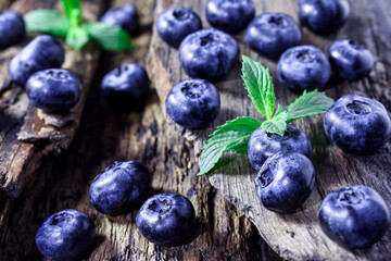 Blueberries on a wooden background.