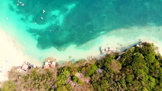 drone shot on island beach of labadee, haiti royal carribean private island