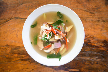 Spicy Chicken Soup - Chicken Tom Yum Spicy Thai food on white bowl