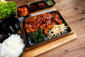 Korean grilled pork set meal with rice and side dishes