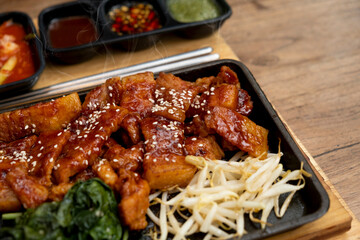 Korean grilled pork set meal with rice and side dishes