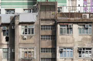 Fototapeta na wymiar Exterior of old residential building in Hong Kong city