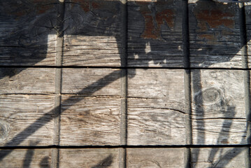 wooden background from boards with shadows