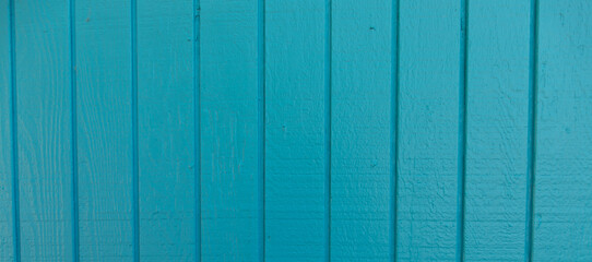 Cyan Painted T1-11 Wall with Vertical Lines Textured Background