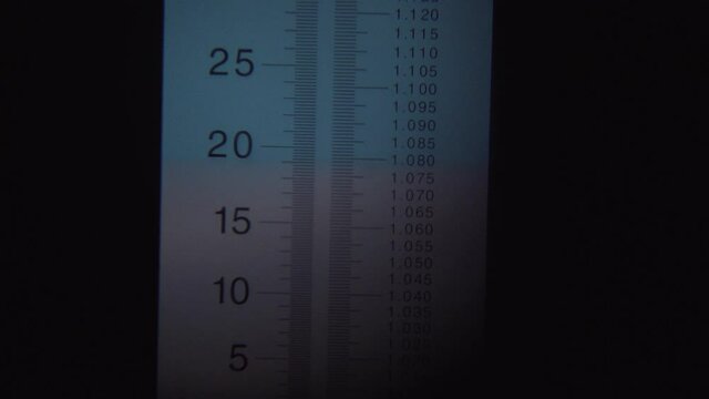 Looking Inside Of A Density Meter Zoom Out To A Hand Holding It