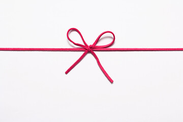 String or twine tied in a bow isolated 
