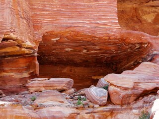 Natural colorful rock section in Petra, Raqmu, an UNESCO World Heritage Site. A historical...