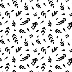 Fototapeta na wymiar Leaves and branches vector seamless pattern. Black brush leaves and twigs. Olive branch modern ornament. Black ink texture with foliage. Hand drawn eucalyptus, laurel twig. Abstract plant motif