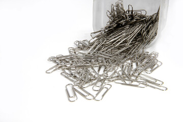 Image of the group steel paperclips on white background with copy space