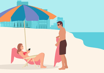 Couple taking sunbath on the beach