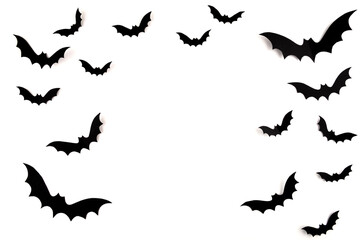 Halloween mock up concept.  Flying black paper bats on white background