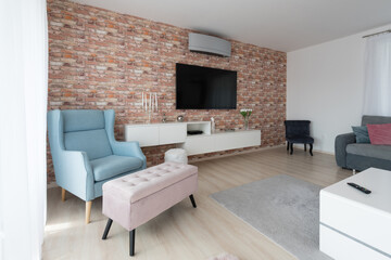 Cabinet and TV in living room of modern house