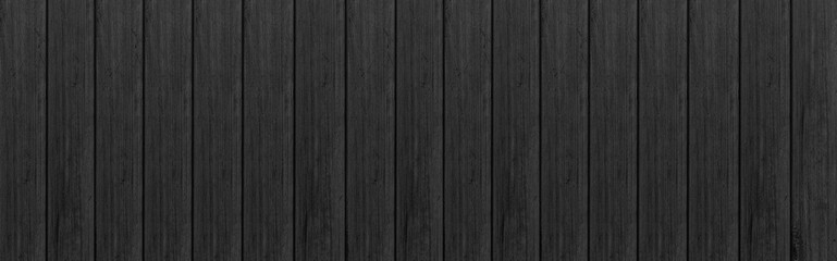 Panorama of Black wood texture background. Abstract dark wood texture on black wall. Aged wood plank texture pattern in dark tone