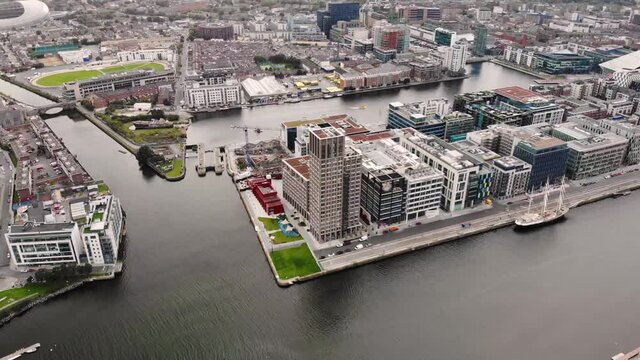 Capital Dock aerial drone fly birds eye shot of the tallest building in Dublin city centre, Ireland