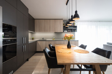 Dining table in kitchen of modern house