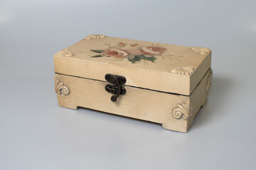 small carved box with old coins