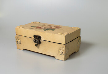 small carved box with old coins