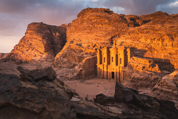 The Monastery or Ad Deir at beautiful sunset in Petra ruin and ancient city of Nabatean kingdom, Jordan, Arab - obrazy, fototapety, plakaty