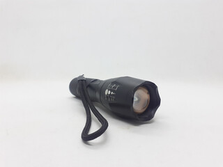 Black Military Style Technical Stainless Steel LED Bright Electric Flashlight in White Isolated Background