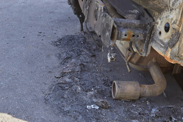 city burned cars after a fire in one of the city's districts