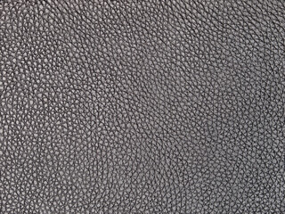 Black smooth leather background, natural leather surface texture