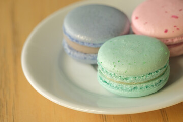 Top view on french macarons in pastel colors