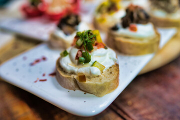 Bread with dessert on top on the white plate