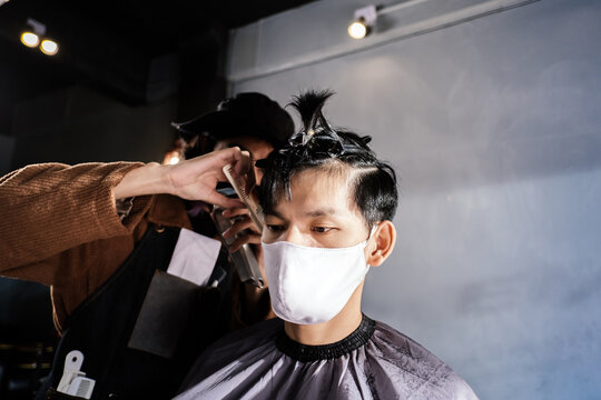 Asia Barber Shop Hair Cut Wearing Face Mask Business Reopening Concept