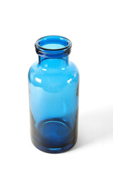 Blue glass bottle isolated on white background