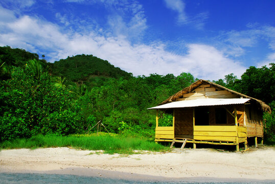 Yellow beach house, hut on the beach