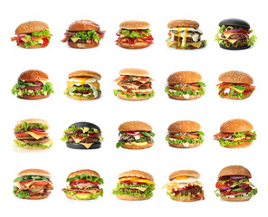 Set of different delicious burgers on white background