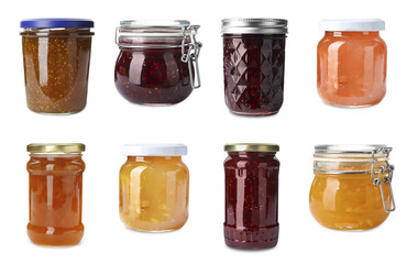 Set of jars with delicious jams on white background