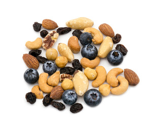 Nuts and berries on white background. Almond, Brazil, Macadamia, Cashew, Blueberries, Raisin